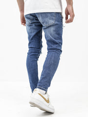 Randomly Distressed Blue Jeans